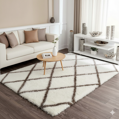 Living room with a white rug featuring brown diamond patterns, beige sofa, and wooden coffee table.